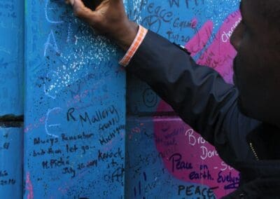 Attendee adds to Belfast Peace Walls.