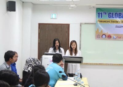 Sally Quimson and Yejin Bae speak at opening program