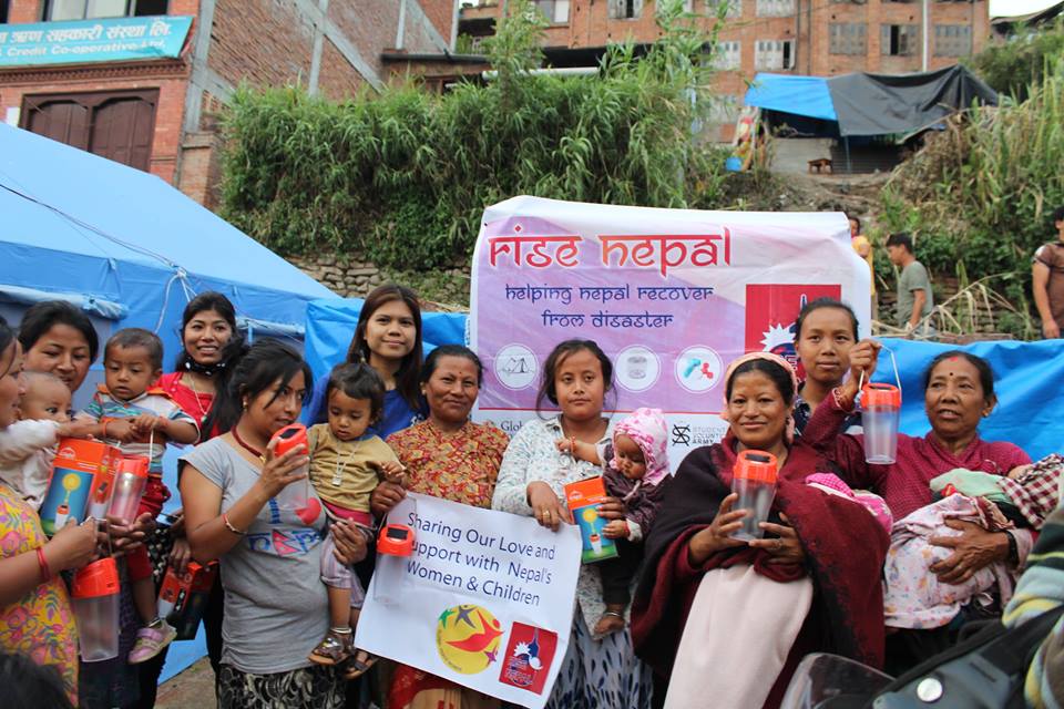 Global Peace Foundation distribute solar lamps to women and children in Bhaktapur.