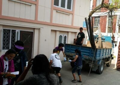 Global Peace Foundation volunteers prep to build transitional shelters.