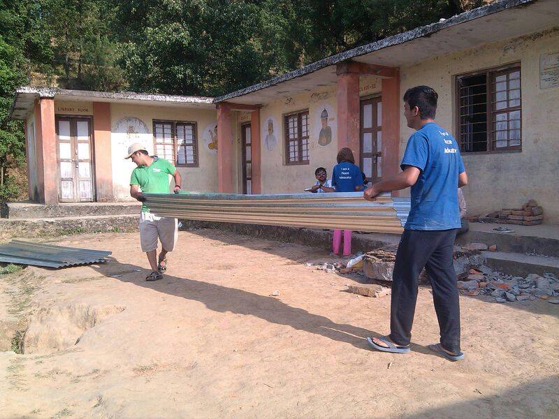 Global Peace Foundation volunteers help rebuild classrooms after Nepal earthquake.