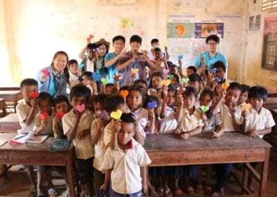 Group photo of GPYE volunteers and school children