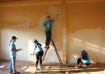 GPYE Volunteers paint "Books for Change" Library