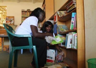 Volunteers wipe books