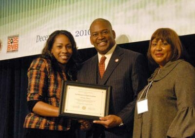 Senator Emanuel Jones presents awards to significant leaders at the Strengthening Families and Communities Coalition Summit in Atlanta, Georgia.