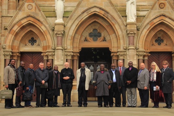 International delegates visit Clonard Monastery in Belfast.