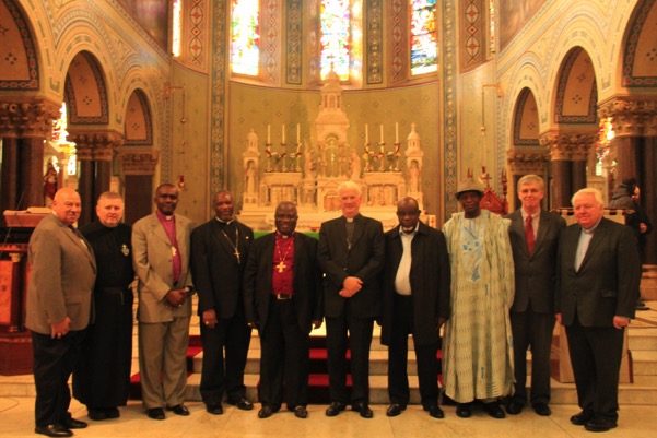 International delegates visit Holy Cross Church in Belfast