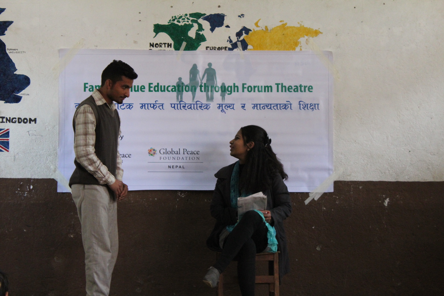 Actors perform during a Forum Theater organized by Sandhya Acharya