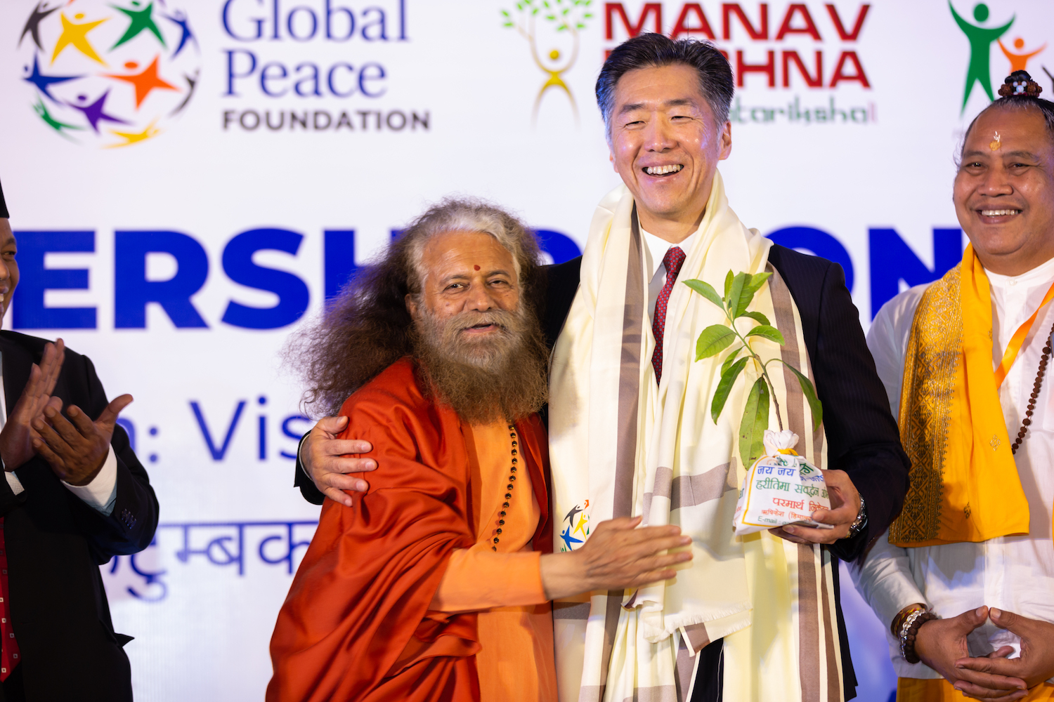 Swami Chidanand Saraswati and Dr. Hyun Jin P. Moon
