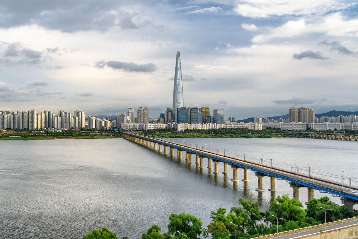 A city with a bridge over a body of water that is part of The Next Korean Miracle.