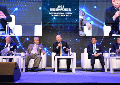 A group of men on stage at the International Forum on One Korea 2023 Held in Seoul.