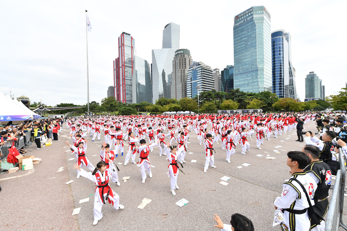 A group of people in red and white uniforms.