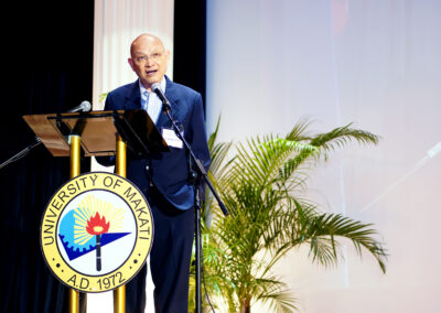 One of the guests of honor and speakers, Mr. Alex Escucha, Chairman of the Board of Trustees at the University of the Philippines Visayas, on stage at the Educators Congress