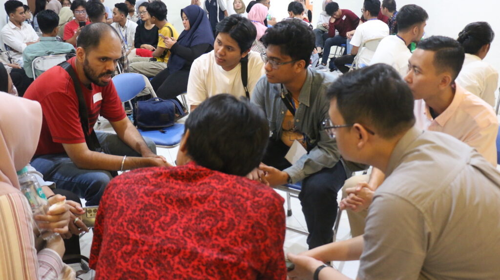 Group of people engaged in a discussion at the Jakarta Cathedral Church for the 