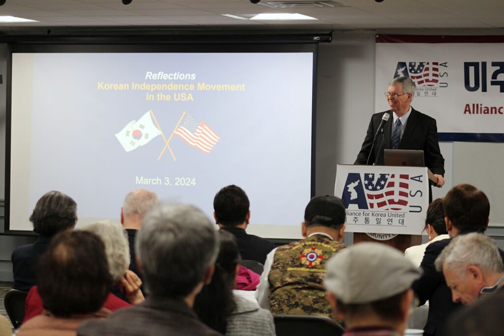 Speaker addressing an audience at a forum about the Korean independence movement in the USA on March 3, 2024, focusing on the significance of the March 1 Movement.