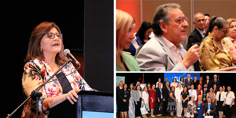 At the 2024 Latin American Ideas Forum in Paraguay, a woman speaks passionately at the podium. Among the attendees, a man with a microphone listens intently. The event captures the spirit of
