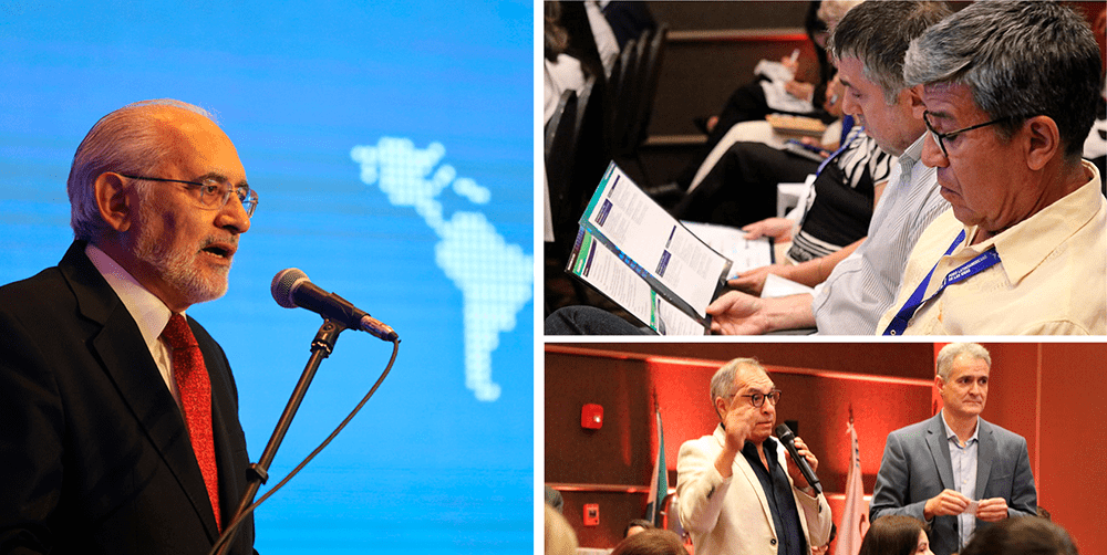 A man at the podium discusses key insights from the 2024 Latin American Ideas Forum in Paraguay, with a map as his backdrop. Another man reads a document alongside attentive colleagues, while a woman, highlighting how Latin America leads the way, speaks into a microphone beside her partner.