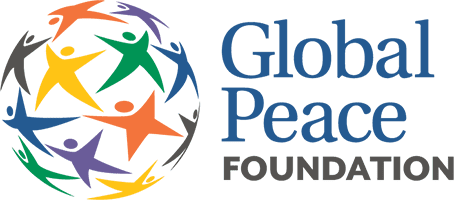 Colorful puzzle pieces form a circle on the left of blue text that reads "Autism Speaks Walk," with the tagline "Powered by love" underneath.