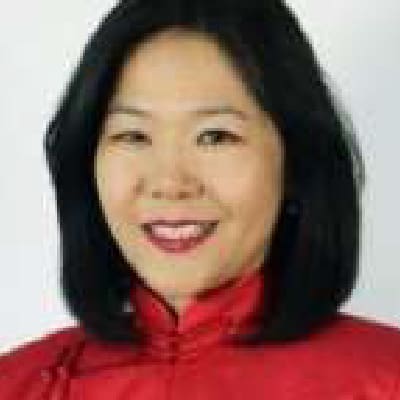 Ms. Chimguundari Navaan-Yunden Chimguundari Navaan-Yunden, a woman with straight black hair wearing a red high-collared top, is smiling in front of a plain light background.